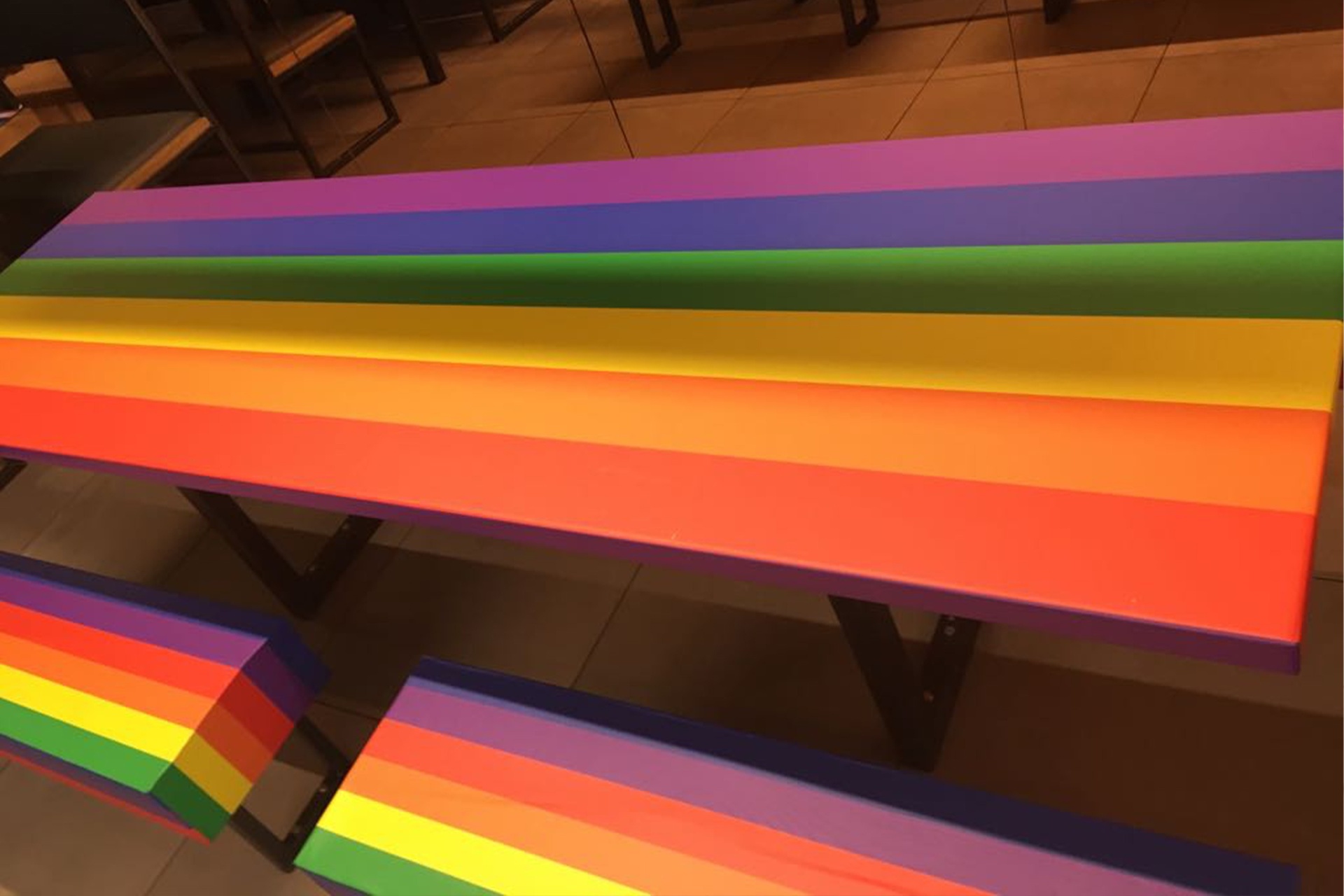 Pride-themed custom table wraps for events