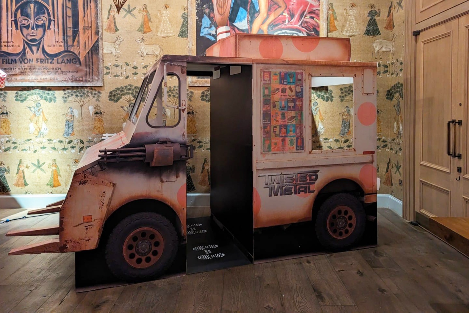 Twisted Metal ice cream van side view in ornate room